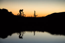 Sportfotografie kuenstlerisch Spiegelung Abendstimmung